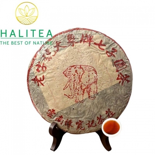 Trà Phổ Nhĩ Sống Hiệu Con Tượng 2003 – Hãng Trà Trần Khoan Ký Sài Gòn Chợ Lớn – Bánh 357g