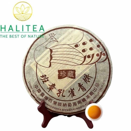 Trà Phổ Nhĩ Sống Nam Kiều Ban Chương Khổng Tước 2006 – Bánh 357g